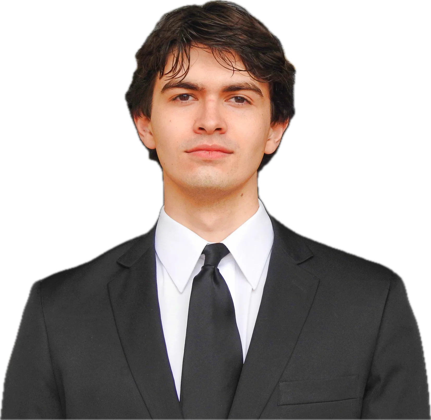 Alex Nanda in a dark suit and tie